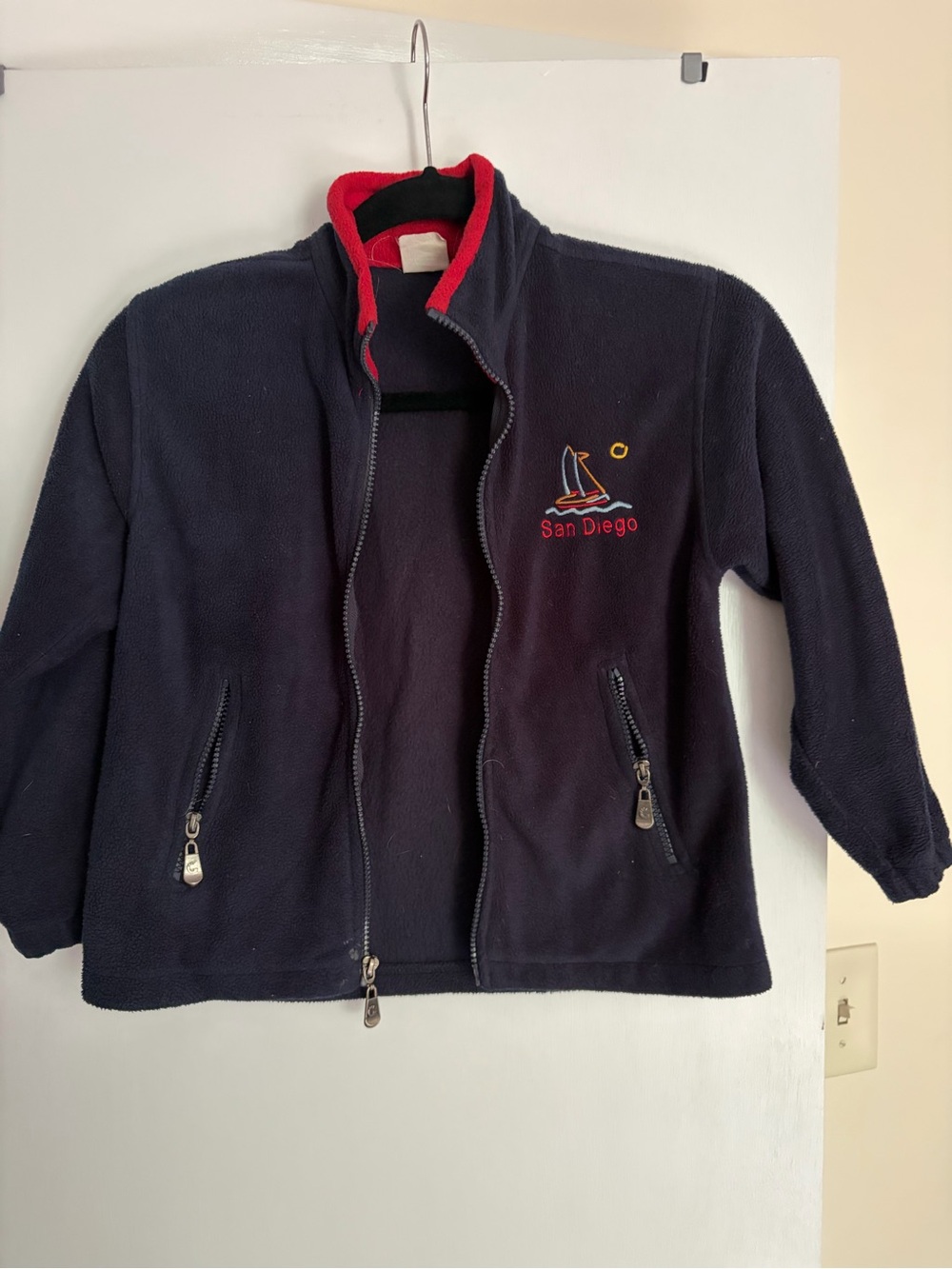Kids Navy Fleece Jacket with Red Trim - San Diego Embroidery